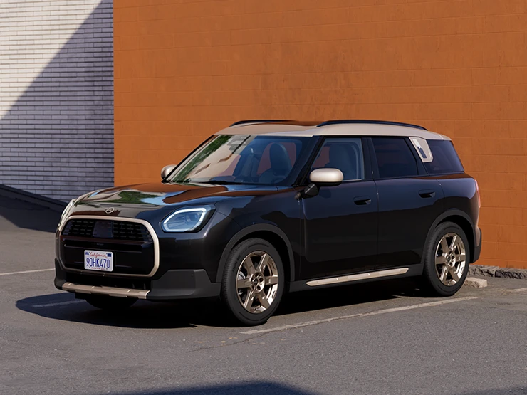 Изглед отпред и отстрани на MINI Countryman в цвят Midnight Black и покрив в цвят Vibrant Silver, което паркира.
