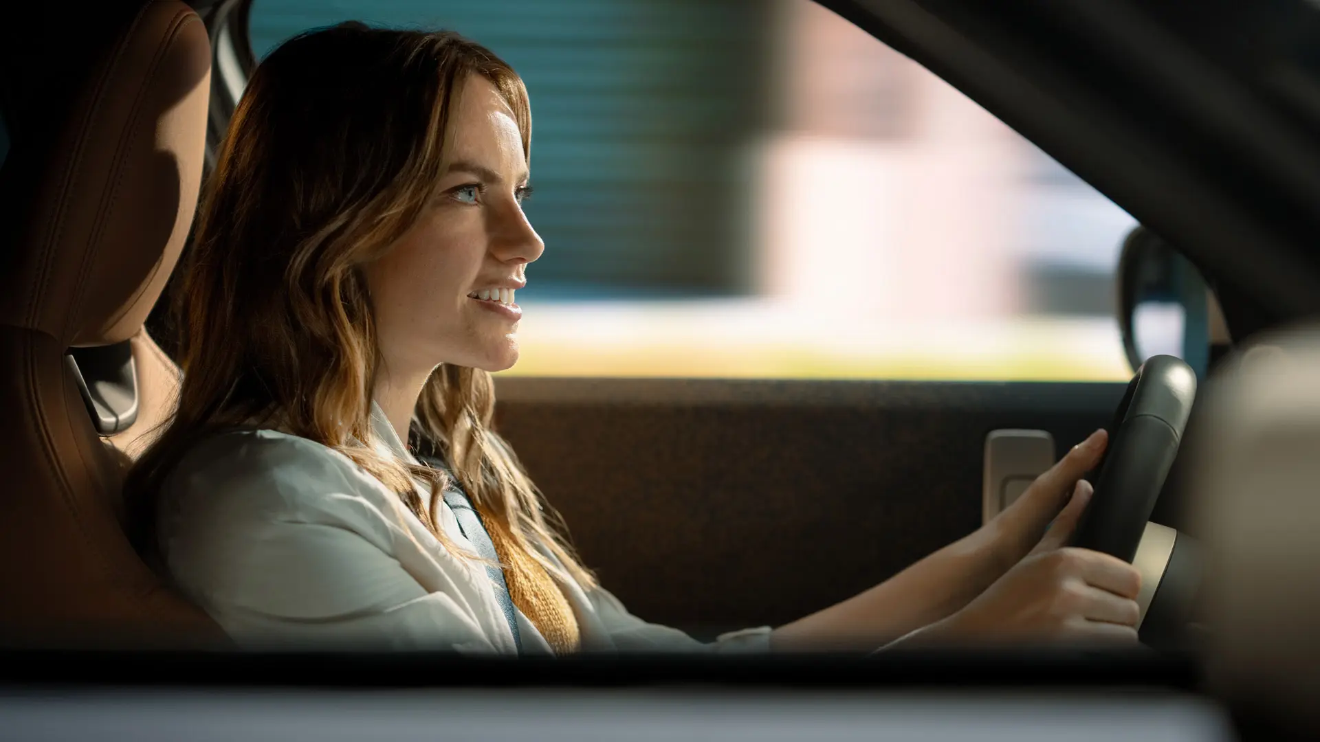 Woman at the wheel.